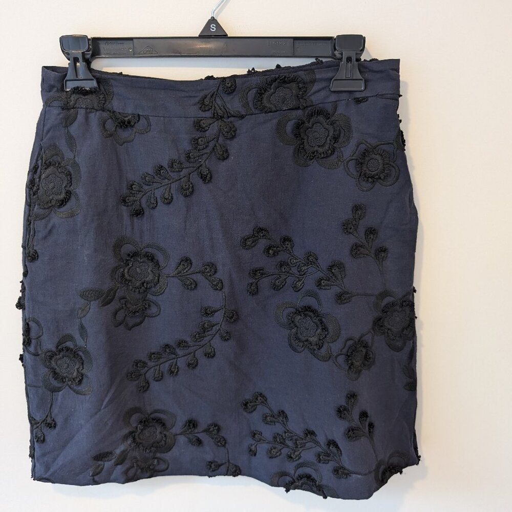 Banana Republic blue skirt with black applique flowers, size 2